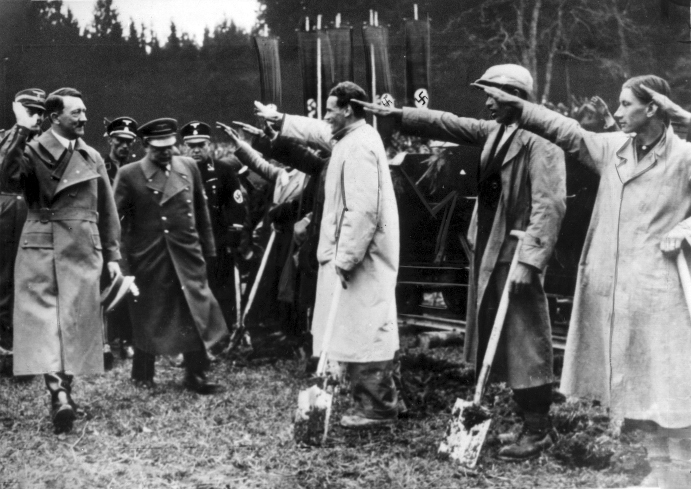 Adolf Hitler salutes workers at the inauguration of the Salzburg-Wien Autobahn